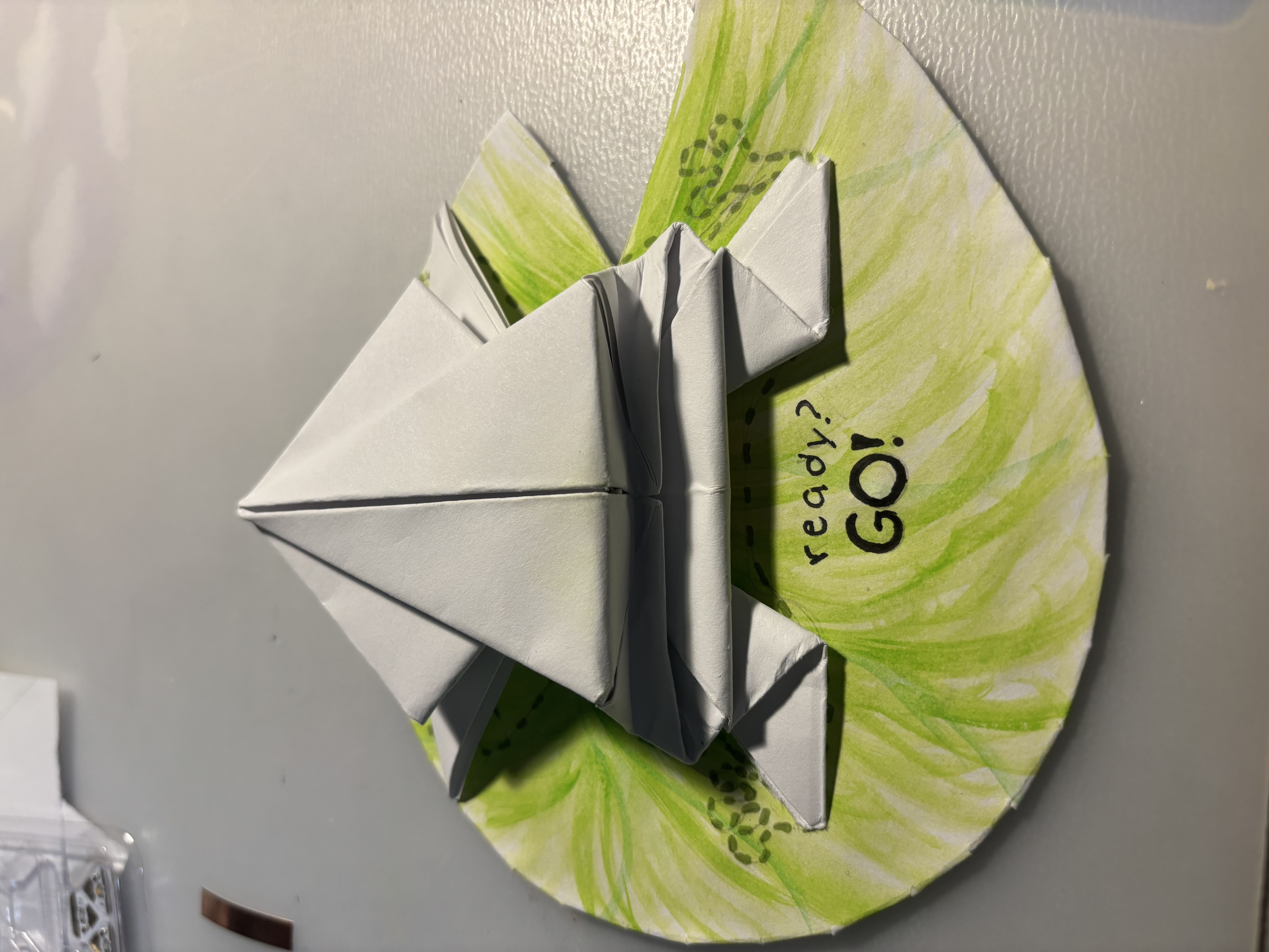 Non-wearable: circuit closes when the user presses down on the frog on top of the lily pad.