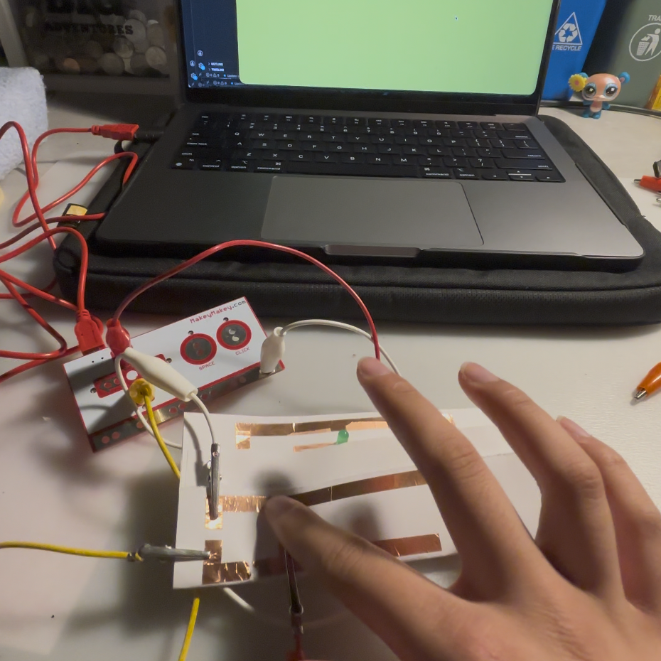 Reusing an old circuit pattern from module 1 with the Makey Makey. <a href='https://youtube.com/shorts/6YgTXjTPJnE?feature=share' target='_blank'><p>Experimentation video link</p></a>